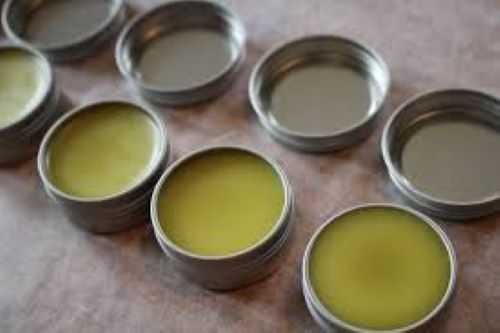 Goldenseal & Myrrh salves all lined up cooling in their tins. 