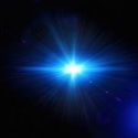 A picture of a bright shining blue  light in the night sky